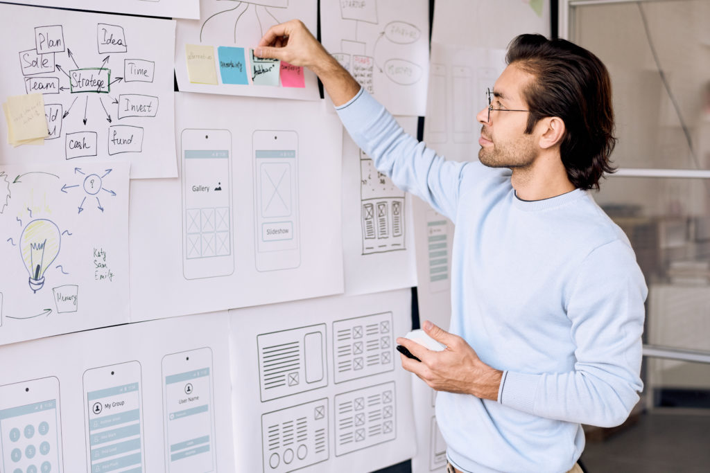 Man working on a project diagram